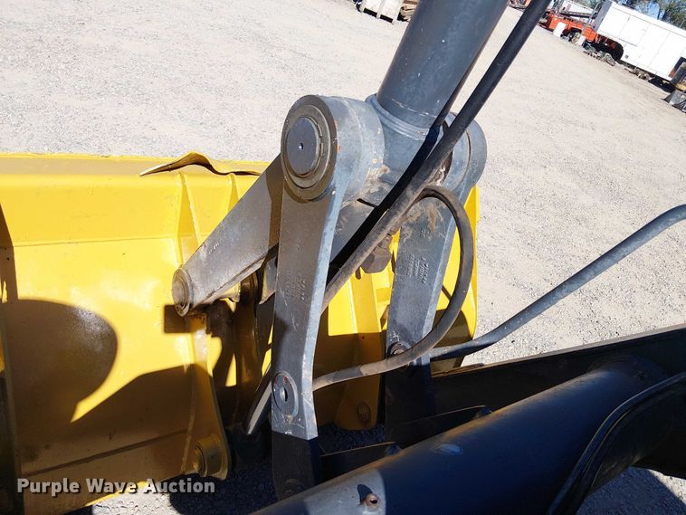 image for item EC1255 2012 John Deere 210K landscape tractor