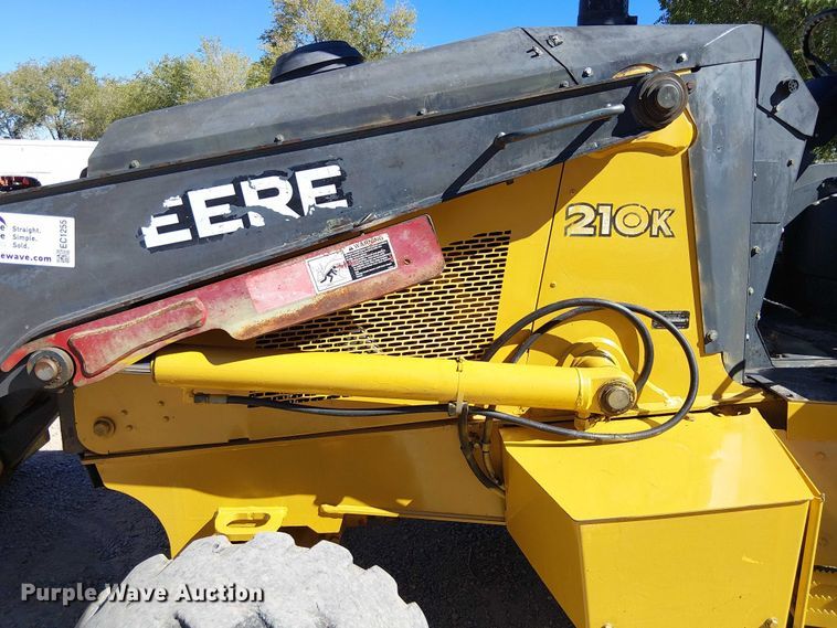 image for item EC1255 2012 John Deere 210K landscape tractor