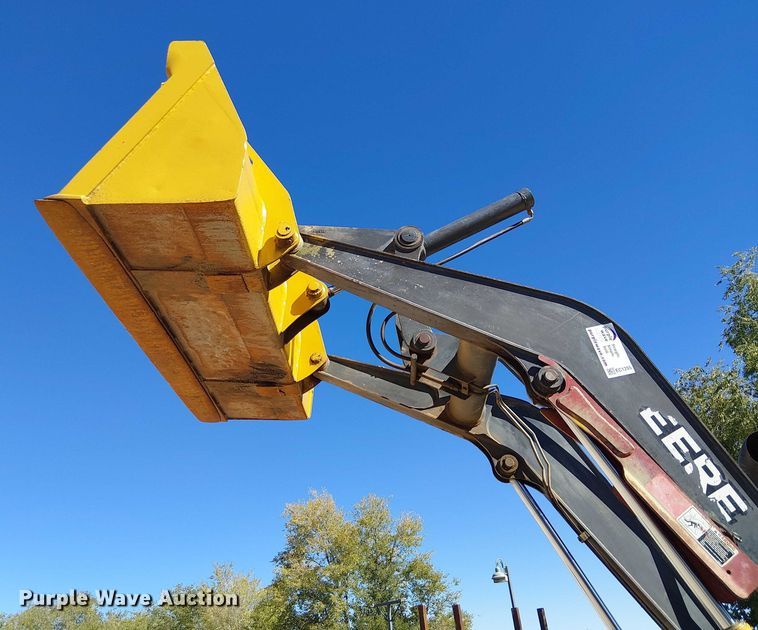 image for item EC1255 2012 John Deere 210K landscape tractor