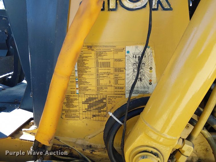 image for item EC1255 2012 John Deere 210K landscape tractor