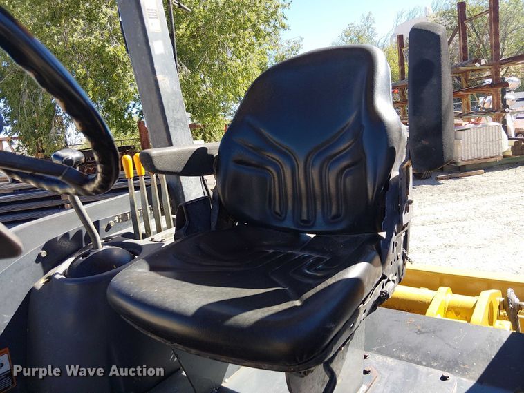 image for item EC1255 2012 John Deere 210K landscape tractor