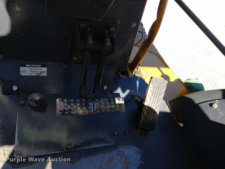 image for item EC1255 2012 John Deere 210K landscape tractor