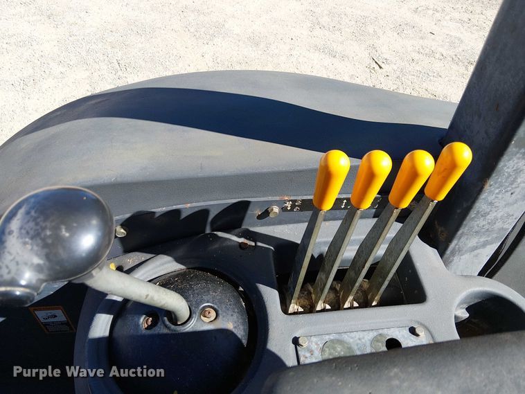 image for item EC1255 2012 John Deere 210K landscape tractor