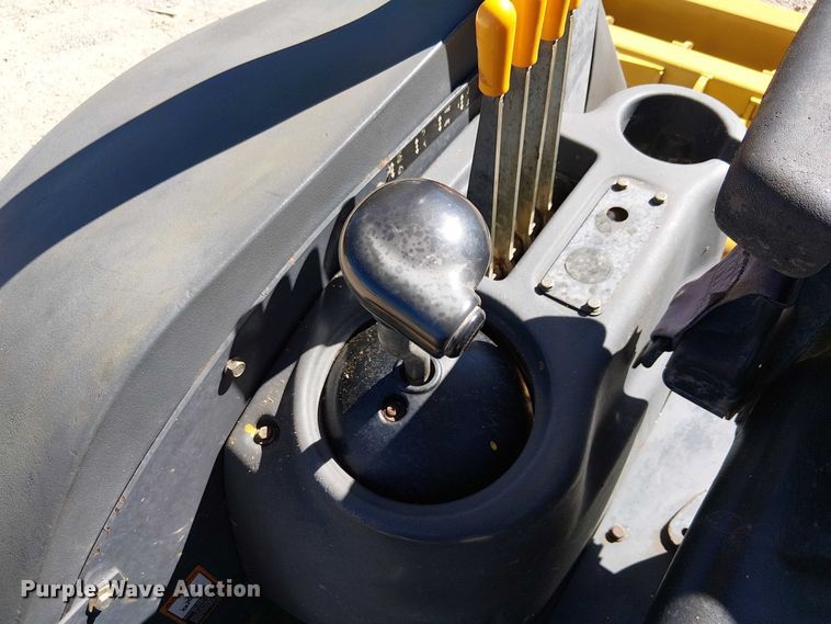 image for item EC1255 2012 John Deere 210K landscape tractor