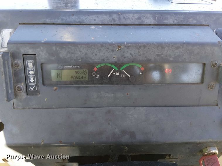 image for item EC1255 2012 John Deere 210K landscape tractor