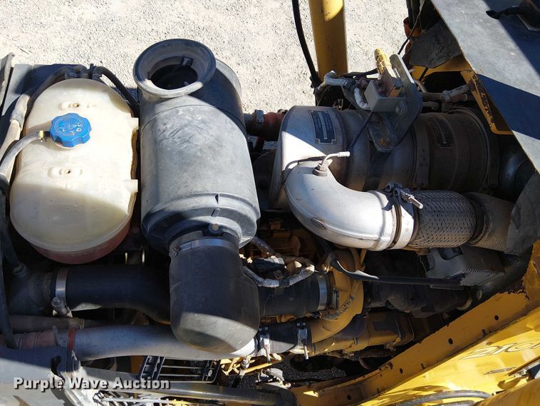 image for item EC1255 2012 John Deere 210K landscape tractor