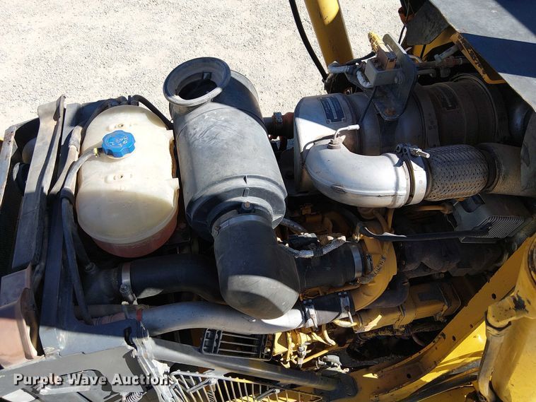 image for item EC1255 2012 John Deere 210K landscape tractor