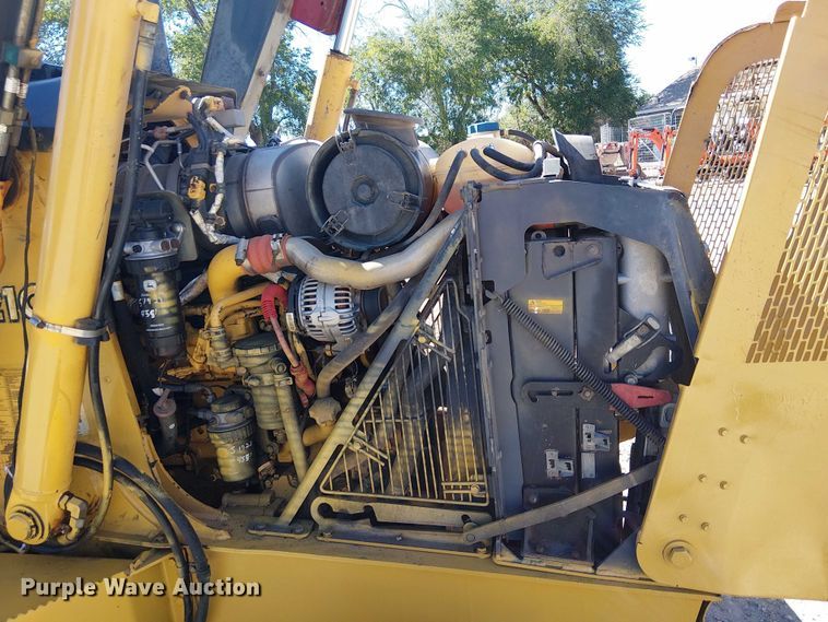 image for item EC1255 2012 John Deere 210K landscape tractor