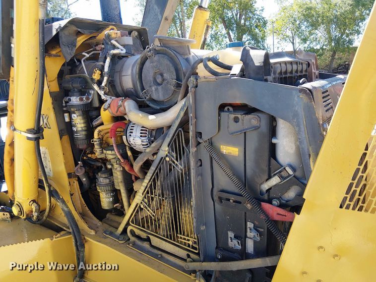 image for item EC1255 2012 John Deere 210K landscape tractor