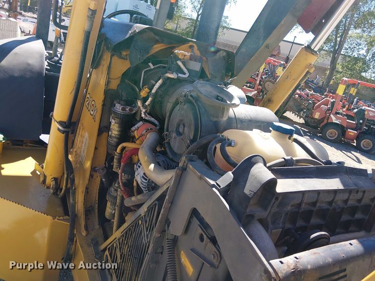 image for item EC1255 2012 John Deere 210K landscape tractor