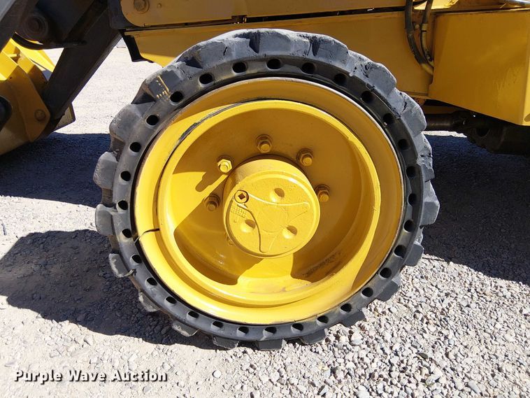 image for item EC1255 2012 John Deere 210K landscape tractor