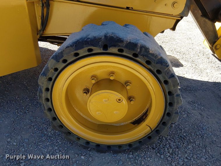 image for item EC1255 2012 John Deere 210K landscape tractor