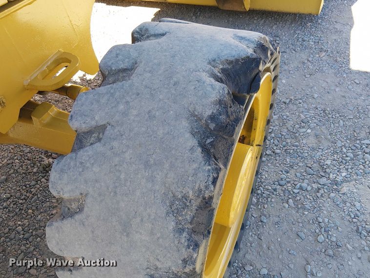 image for item EC1255 2012 John Deere 210K landscape tractor