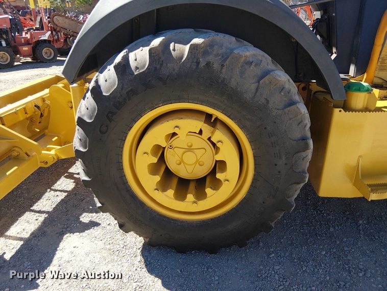 image for item EC1255 2012 John Deere 210K landscape tractor