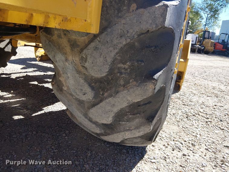 image for item EC1255 2012 John Deere 210K landscape tractor