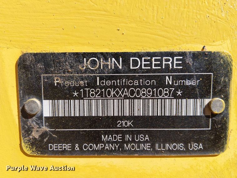 image for item EC1255 2012 John Deere 210K landscape tractor