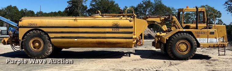 image for item EC3879 1997 Caterpillar 613C Series II water wagon