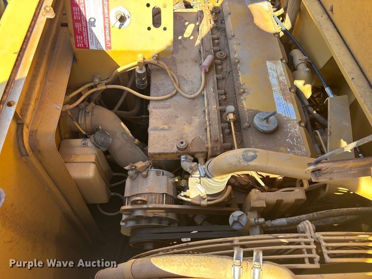 image for item EC3879 1997 Caterpillar 613C Series II water wagon