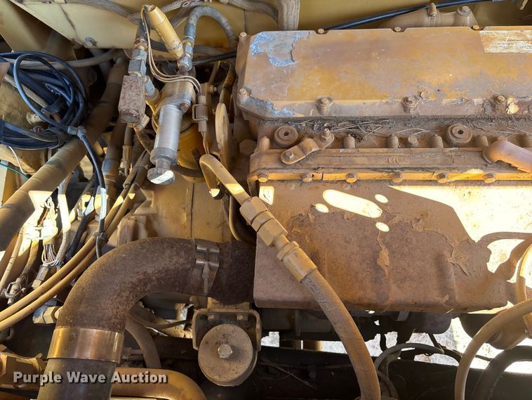 image for item EC3879 1997 Caterpillar 613C Series II water wagon