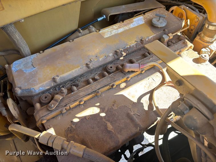 image for item EC3879 1997 Caterpillar 613C Series II water wagon