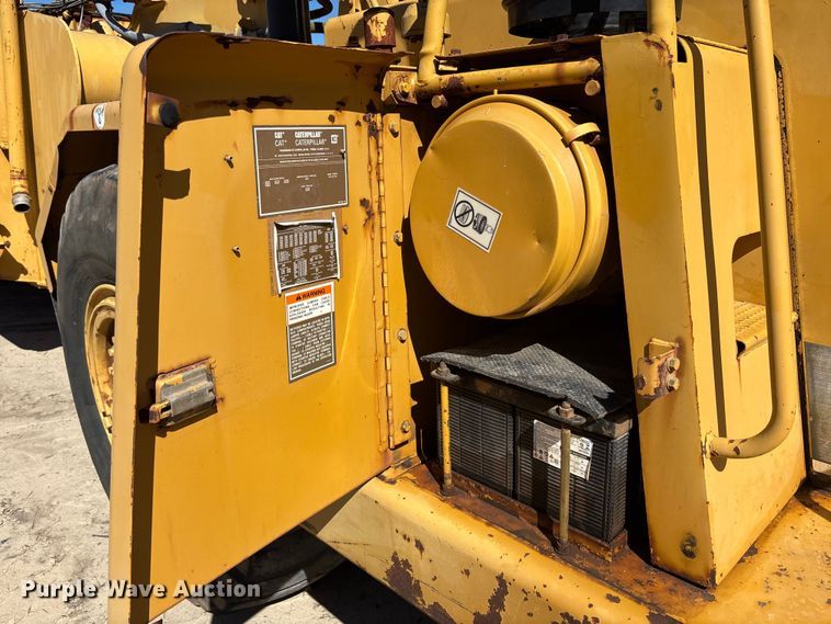 image for item EC3879 1997 Caterpillar 613C Series II water wagon