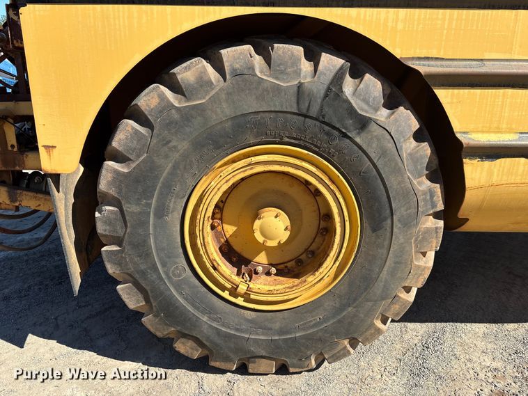 image for item EC3879 1997 Caterpillar 613C Series II water wagon