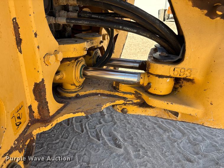 image for item EF6124 2014 John Deere 310SK backhoe