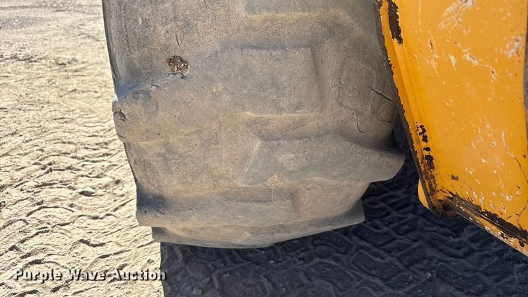 image for item EF6124 2014 John Deere 310SK backhoe