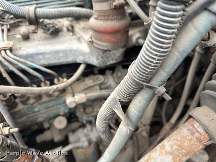 image for item EL0049 1991 International 4700LP hook lift truck