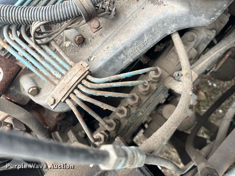 image for item EL0049 1991 International 4700LP hook lift truck