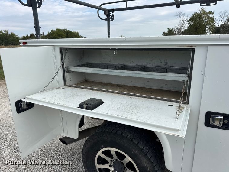 image for item EN0559 2015 RAM 2500 Crew Cab utility bed pickup truck