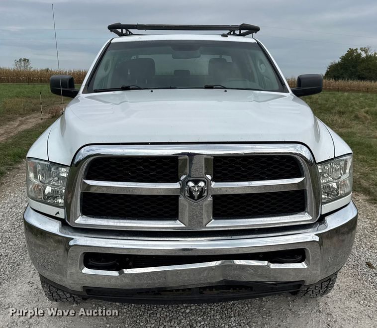 image for item EN0563 2016 RAM 2500 Crew Cab utility bed pickup truck