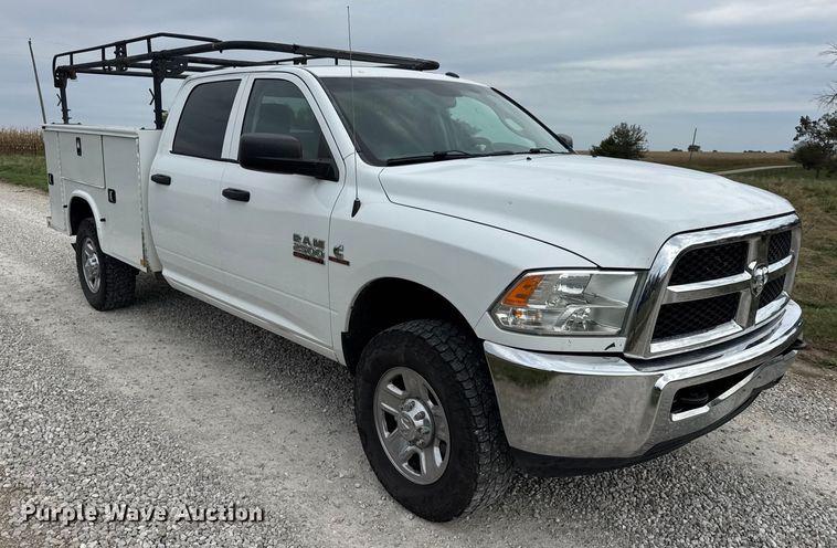 image for item EN0563 2016 RAM 2500 Crew Cab utility bed pickup truck