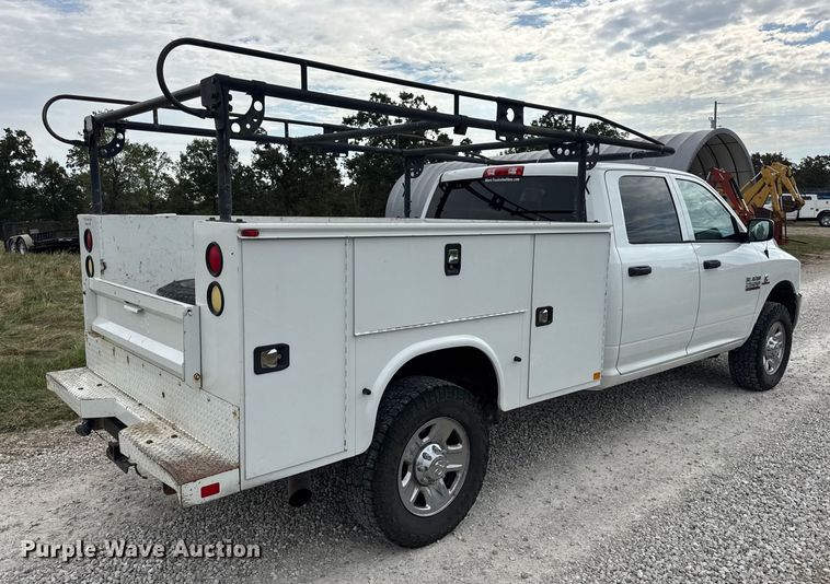 image for item EN0563 2016 RAM 2500 Crew Cab utility bed pickup truck