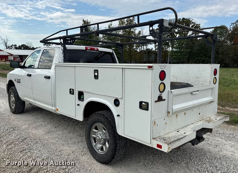 image for item EN0563 2016 RAM 2500 Crew Cab utility bed pickup truck