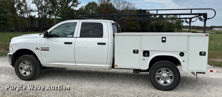 image for item EN0563 2016 RAM 2500 Crew Cab utility bed pickup truck