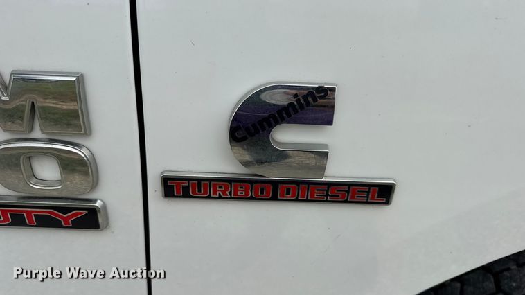 image for item EN0563 2016 RAM 2500 Crew Cab utility bed pickup truck