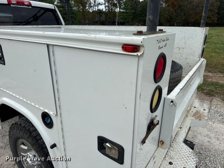 image for item EN0563 2016 RAM 2500 Crew Cab utility bed pickup truck