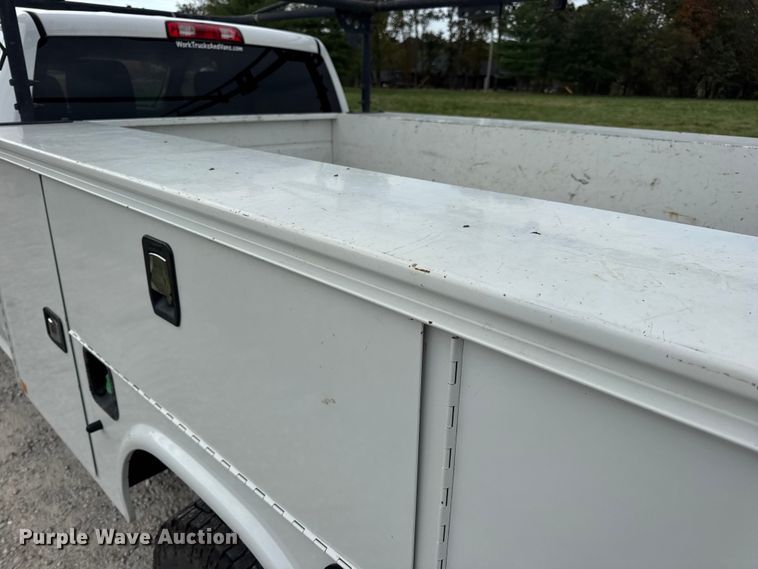 image for item EN0563 2016 RAM 2500 Crew Cab utility bed pickup truck
