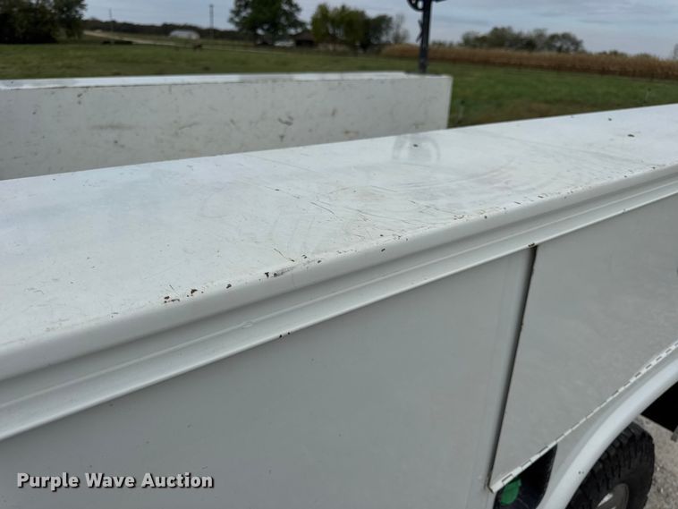 image for item EN0563 2016 RAM 2500 Crew Cab utility bed pickup truck