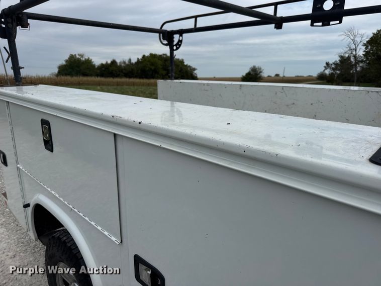 image for item EN0563 2016 RAM 2500 Crew Cab utility bed pickup truck