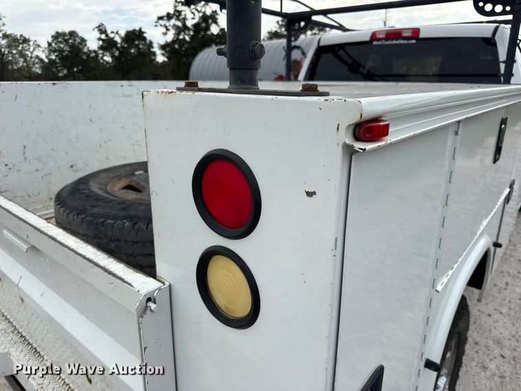 image for item EN0563 2016 RAM 2500 Crew Cab utility bed pickup truck