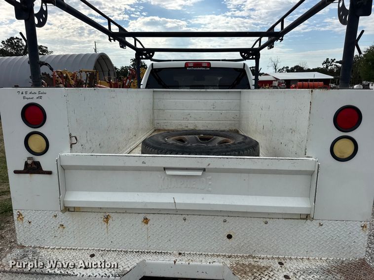 image for item EN0563 2016 RAM 2500 Crew Cab utility bed pickup truck