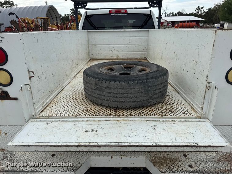 image for item EN0563 2016 RAM 2500 Crew Cab utility bed pickup truck