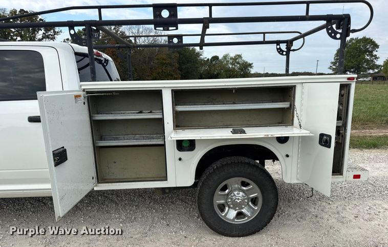 image for item EN0563 2016 RAM 2500 Crew Cab utility bed pickup truck