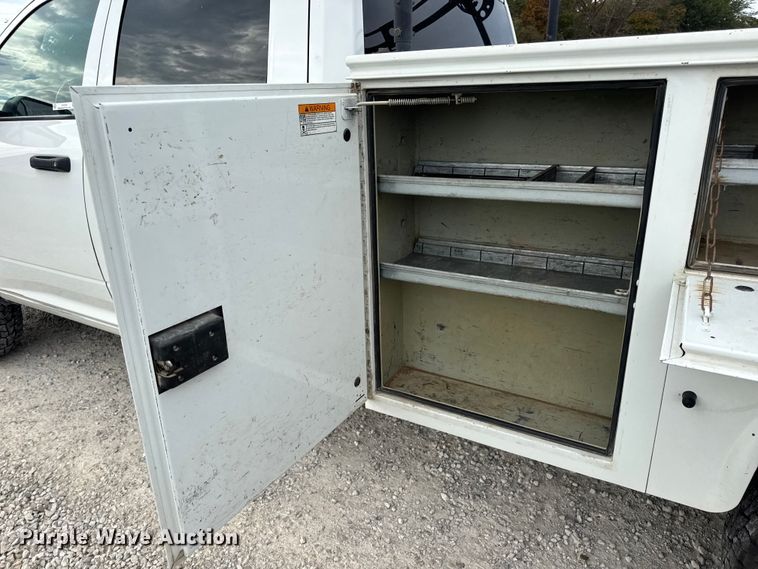 image for item EN0563 2016 RAM 2500 Crew Cab utility bed pickup truck