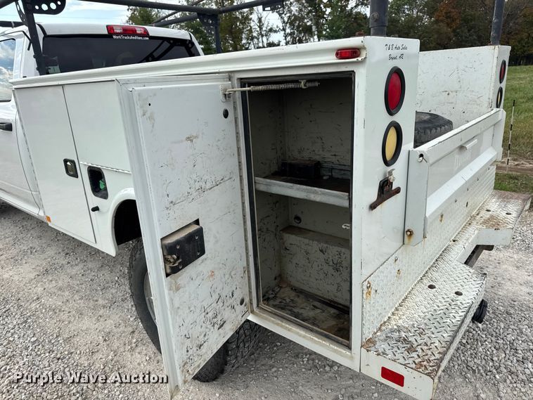 image for item EN0563 2016 RAM 2500 Crew Cab utility bed pickup truck