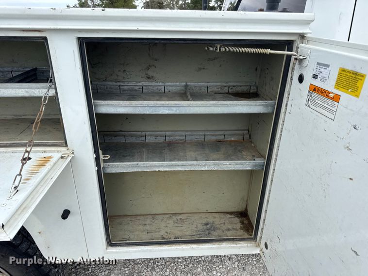 image for item EN0563 2016 RAM 2500 Crew Cab utility bed pickup truck