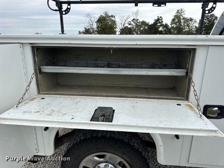 image for item EN0563 2016 RAM 2500 Crew Cab utility bed pickup truck