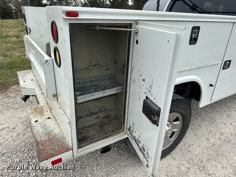 image for item EN0563 2016 RAM 2500 Crew Cab utility bed pickup truck